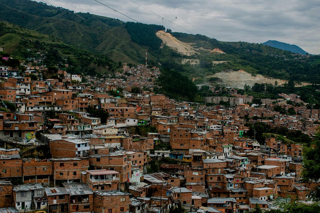 Explore vibrant Comuna 13's urban landscape in Medellín, Colombia from above.