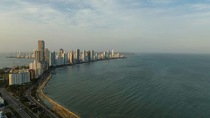 Stunning aerial view of Cartagena's modern skyline along the coast.