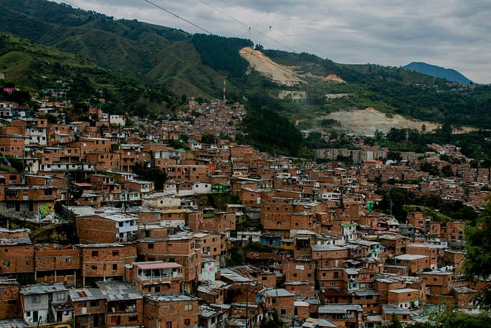 Explore vibrant Comuna 13's urban landscape in Medellín, Colombia from above.